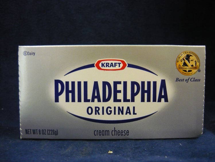 Spread a brick of Philadelphia cream cheese in the pie dish as the 1st layer