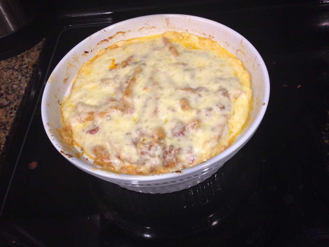Bake in the oven at 350 until cheese on top is completely melted and a little golden on the edges. Experiment with it! Use different cheeses and add what you like! :)