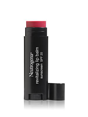7. Tinted Lip Balm
Tinted lip balm, much like tinted moisturizer, is an essential because it's so, so, so easy to apply. It's not like applying lipstick, where you have to spend time in front of the mirror to make sure you aren't bleeding color from your lips--