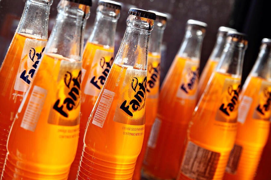 3 ounces any type of orange soda or orange juice (I like it with orange soda better)