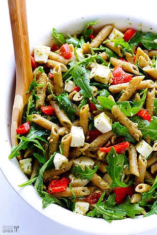 3. Colorful Pasta Salad. 
Pasta + arugula + mozzarella + red peppers + pesto. Get the recipe.
http://www.gimmesomeoven.com/5-ingredient-pasta-salad/