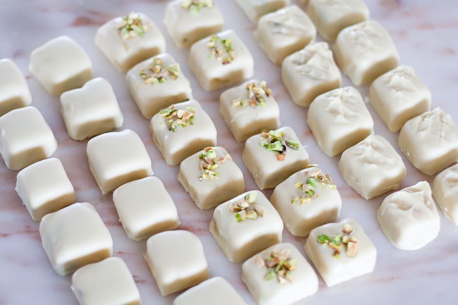 9.Once the chocolate has hardened, trim off any “feet” with a sharp knife.
Once fully set, cut off any feet with a sharp knife.

*Tip: Try to handle the chocolate as little as possible or wear food safe gloves to that you don’t leave fingerprints on the chocolate.