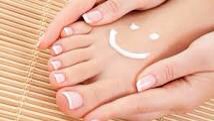 Then grab some petroleum jelly or coconut oil and massage it all over your feet, for about five minutes to improve the blood circulation. Slip into a pair of comfy socks to work the magic overnight.