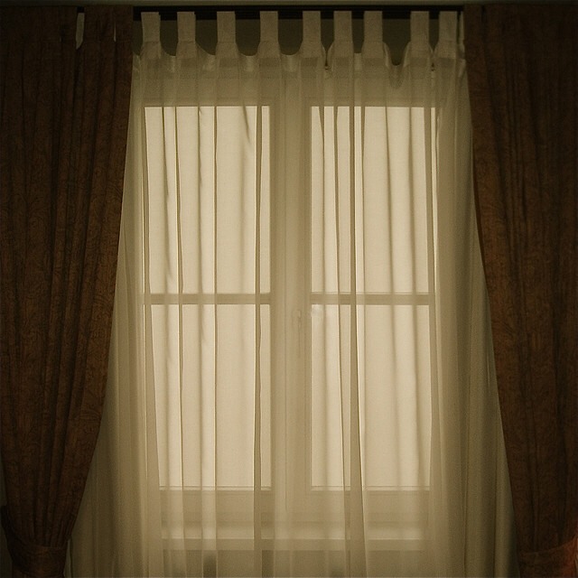 Have curtains that let natural light in. The morning sun shining through will help you wake up even without an alarm clock!