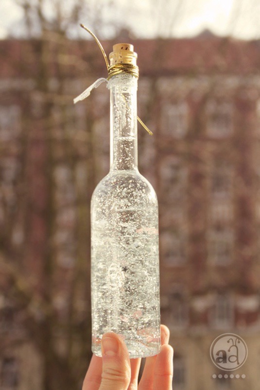 31. Create A Magic Bottle
There really is something so magical about these, especially to little girls. You can fill it with glitter, sequins, plastic confetti, or anything else that sparkles. They are fun to shake and then watch as all of the stuff sinks to the bottom.