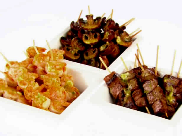  When using foods with different cooking times (such as shrimp 
 and beef), don't combine them on the same skewer. Instead, 
 make skewers of just shrimp or just beef, start cooking the 
 beef first, and then combine them on a serving platter. 
