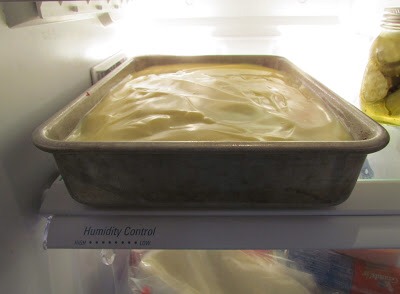 Once your cake has completely cooled, spread on whipped topping.