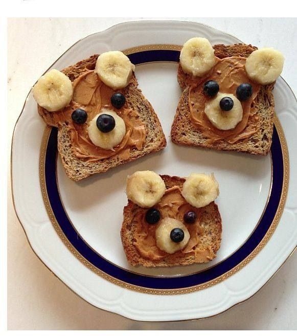 Fun for kids! Bread, peanut butter, bananas, and blue berries. 