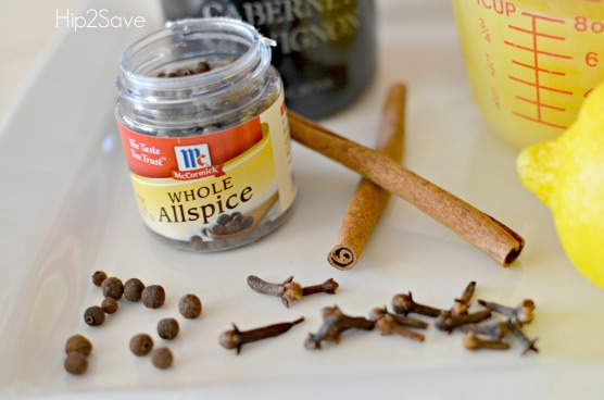 Hot Spiced Wine Recipe

Ingredients:
* 1 quart water (4 cups)
* 3 cups sugar
* 1/2 t. ginger
* 4″ cinnamon stick
* 6 whole allspice
* 12 whole cloves
* Rind of an orange or lemon
* 2 cups unsweetened orange juice
* 1 cup lemon juice
* 1 quart Burgundy Wine