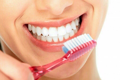 Brush your teeth before your picture. You don't want anything in your teeth 