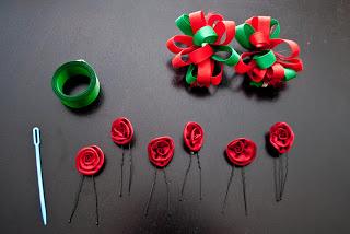 This is one of my favorite Holiday Hairstyles.  It can be formal or casual and it holds all day long.

These are the supplies you will need:  Green ribbon, a plastic yarn needle, flower hair pins, and a Christmas hair clip or two.