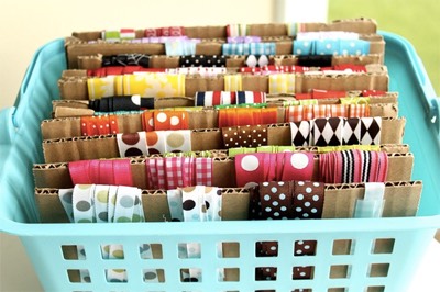 OR….if you don’t want to bother rounding up popsicle sticks….you can also use plain old cardboard! Cut up some cardboard, pick up a cute basket at the dollar store and you’re set! Cute presentation too. :-)