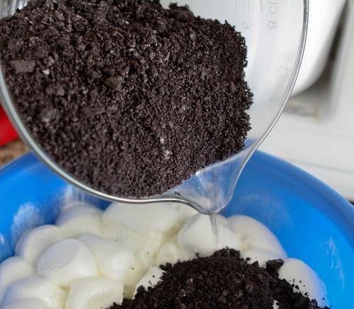 Working quickly, pour in your ground cookies.