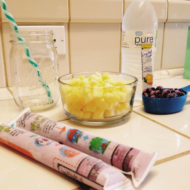 Ingredients:
1/3 cup frozen blueberries
1 1/3 cup of frozen pineapple chunks
2 Gogurt sticks or a tub of yogurt
1 1/2 cups of lemonade