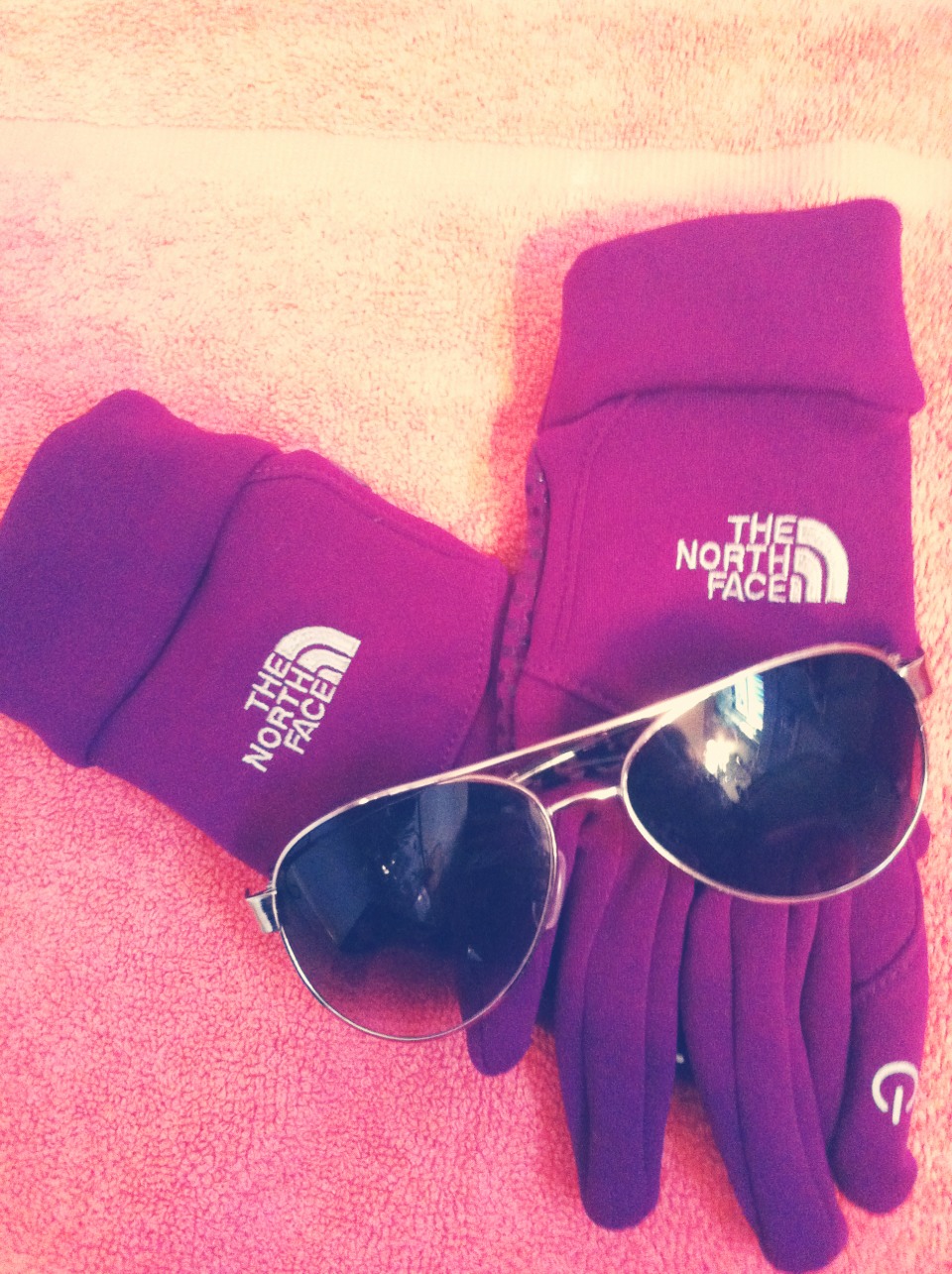 Sunglasses for summer and gloves for winter! I bring my northface e-tips and my aviators 