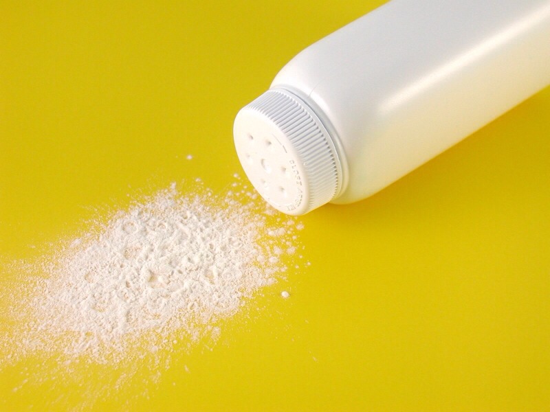 5. Brush talcum powder through your hair to freshen it up. 