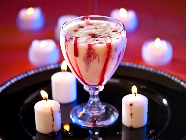 The Vampire Cocktail

Ingredients:
1 scoop vanilla ice cream 
1 oz. triple sec 
1/2 oz. white crème de cacao 
drizzle of grenadine

Preparation:
Blend all ingredients except grenadine until smooth, pour into a stemmed cocktail glass. Drizzle grenadine over the top.
