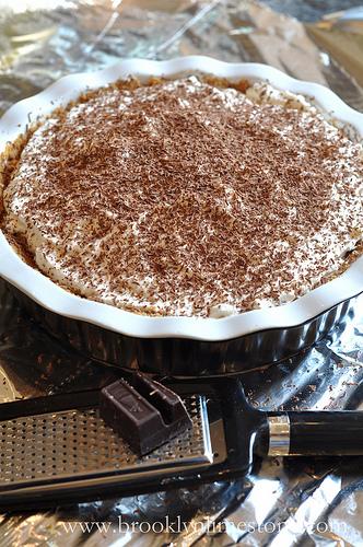 Grate chocolate on top (optional)
Put in fridge to set for at least 2 hours.

So there you have it. Yum in a pan. I dare you not to love it.