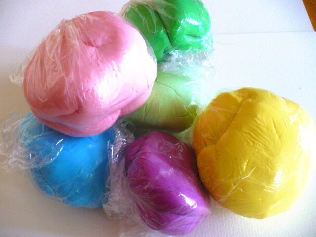 To store your fondant wrap them in pieces of lightly greased plastic wrap and keep them either in a big ziplock bag or a tupperware container. The fondant is essentially a sugar paste (its just marshmallows and icing sugar) so it has a shelf life of three or four months. I