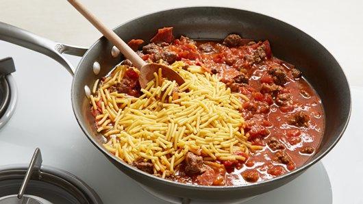 2 of 3
Stir in spaghetti sauce, water and uncooked spaghetti. Bring to a boil; stir. Reduce heat to medium-low; cover and cook 10 to 15 minutes or until spaghetti is of desired doneness, stirring occasionally.