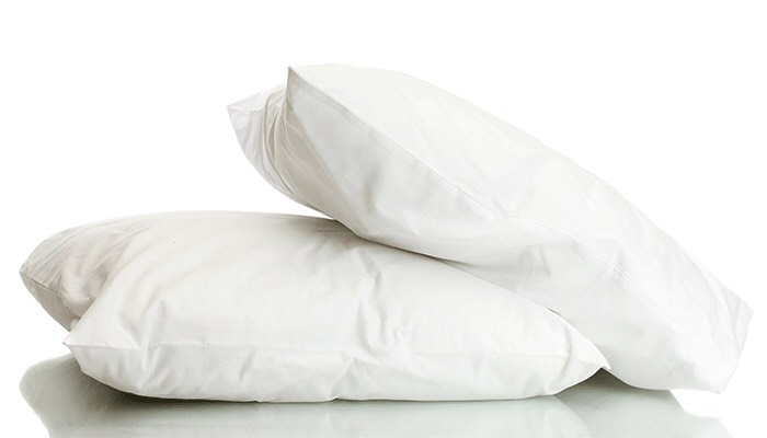 Wanna fight puffiness? Go to sleep. Sleeping propped up on two pillows instead of one can help reduce puffiness by helping drain fluid from your face. Literally. That’s it.