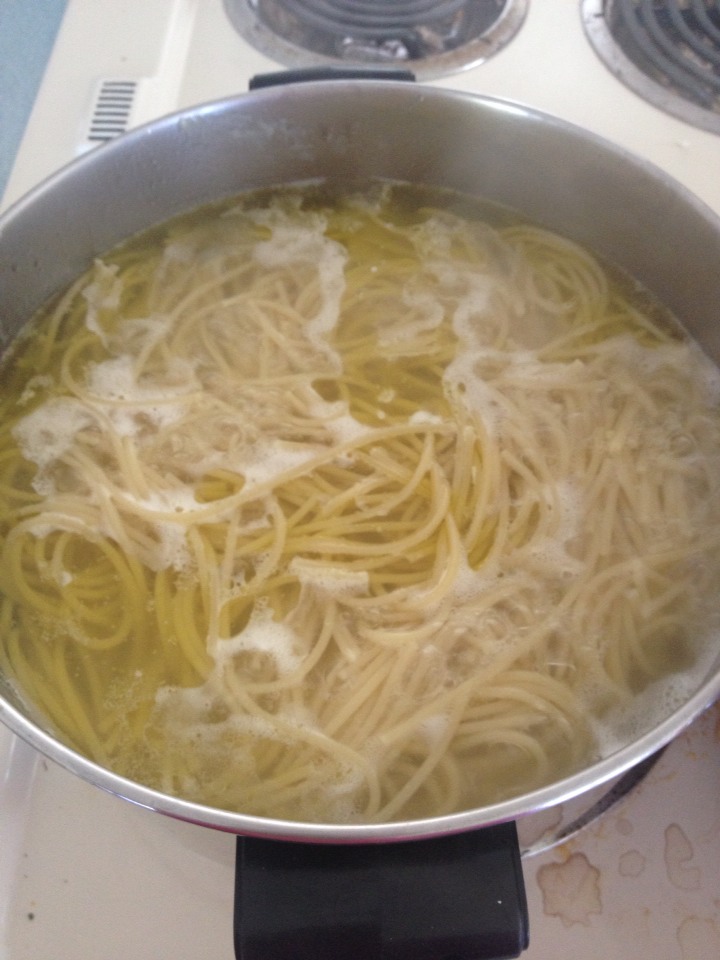 While the meat is browning, put some water to boil & add a large packet of whole grain wheat spaghetti noodles