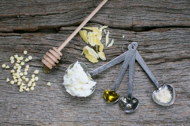 SUPPLIES NEEDED:
1 tablespoon shea butter
1 teaspoon each: honey, almond oil and olive oil
1 teaspoon grated beeswax
5 white chocolate chips
3-4 drops vanilla extract
Lip balm container
