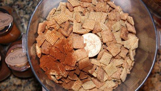 1) In food processor or large resealable food-storage plastic bag, combine 5 cups Cinnamon Chex™ cereal, 2 teaspoons ground cinnamon and dash ground red pepper (cayenne). Process or use rolling pin to crush cereal. Pour into shallow dish.