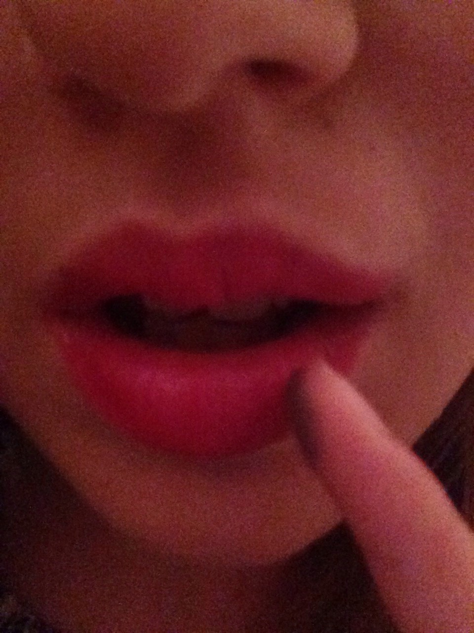 Apply your dark eye shadow by dabbing it on your bottom lip