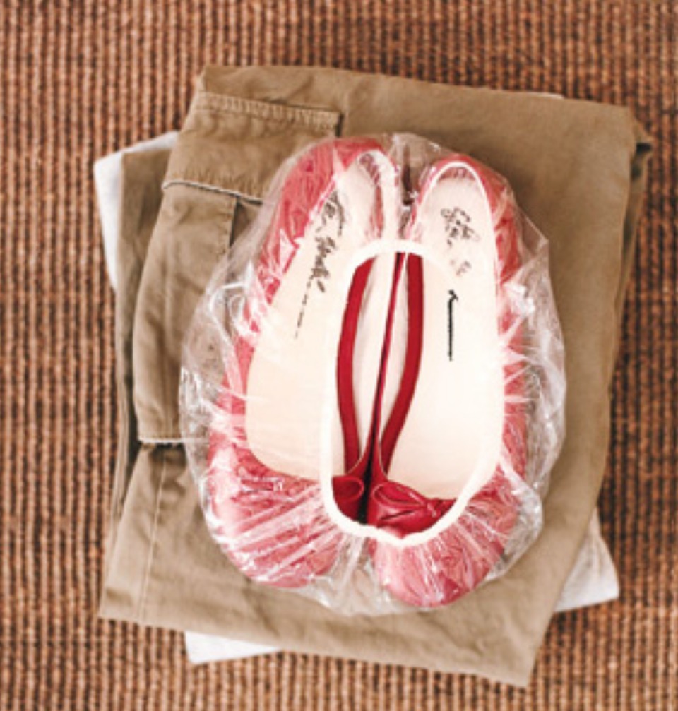 When you pack up your suitcase wrap it In a shower cap to prevent the dirty soles touching the clean clothes 