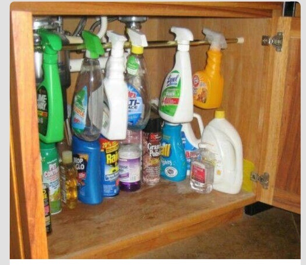 Curtain rod underneath the sink 