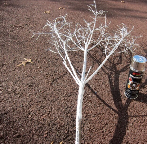 Spray it with silver spray paint to cover.  Let dry.
