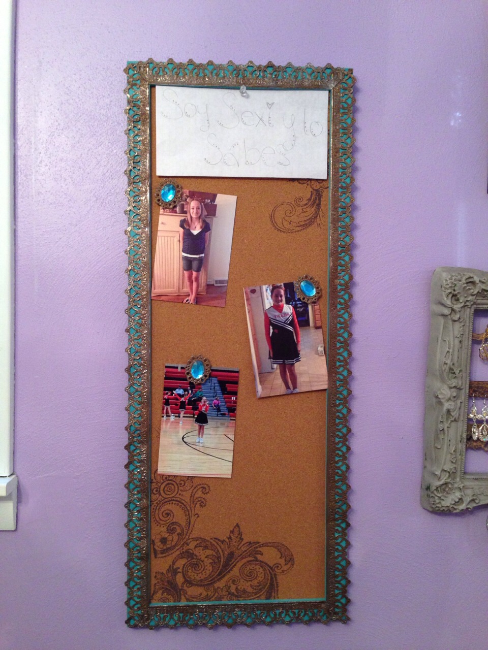 I have a bulletin board in my room and I put pictures and sayings on it
