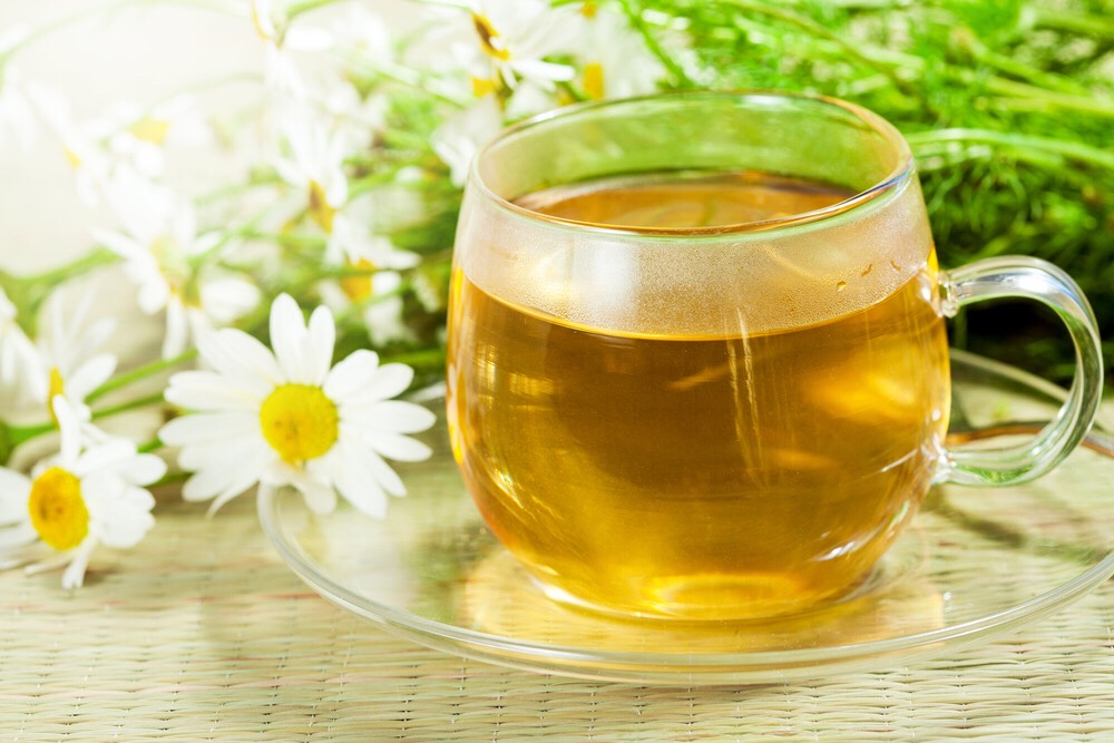 Use some chamomile tea to lighten your hair. All you do is boil the water, let the bags steep, then add to your hair. You can go out into the sun until it dries for a better effect of stay inside