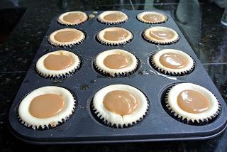 Spoon about 1 tablespoon caramel over each cheesecake.