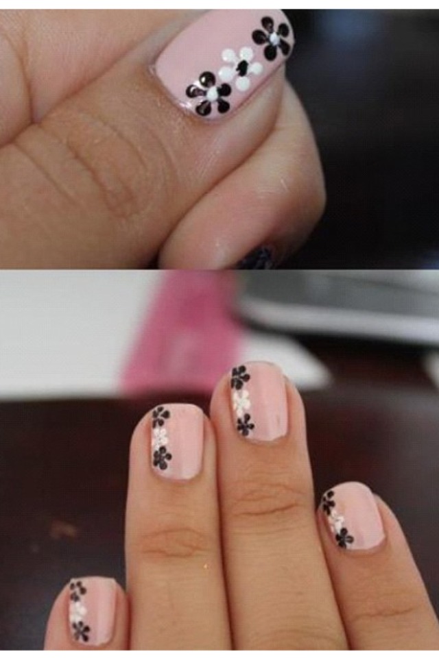 After painting your nails any desired color you can add little flowers anywhere you'd like. Apply a thin coat of clear nail polish where you want the flowers. With a dotting tool apply 5 dots in a circle. With a toothpick, pull dots into the center. Put a single dot of sparkly polish in the center.