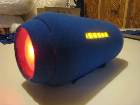 I only had two simple things to skin this time. The main body of the Mega Buster, and its gun tip. For the main body I had to hot glue the medium tupperware bowl that was next to the tip of the gun to the pitcher.
