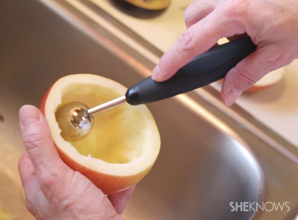 Cut the top bit off the apple, and scoop out all the inside flesh.  If preparing apples more than 5 minutes before serving, squeeze lemon juice over the apple to stop it from browning.