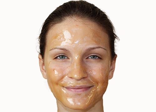 3)Using clean hands, apply the mixture onto your face, avoiding the sensitive areas around your mouth and eyes.