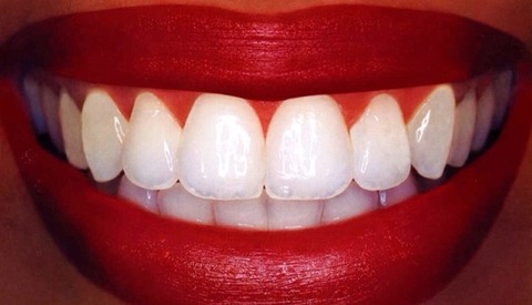 9. Apply to the teeth it prevents lipstick from getting on your teeth