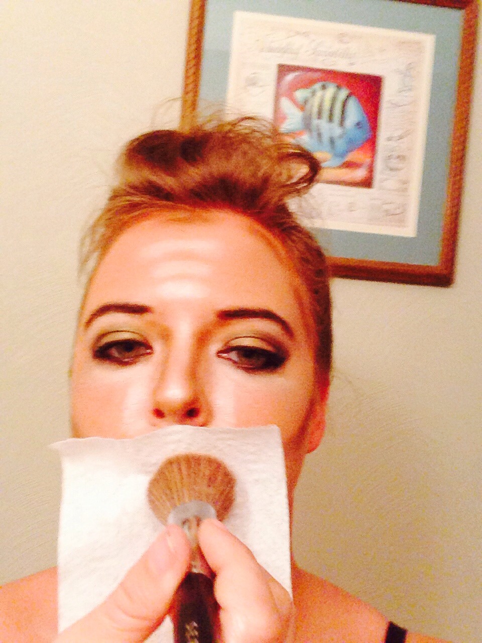 Press a piece of tissue paper to lips and brush with a loose powder like Bare Essentuals Mineral Veil.