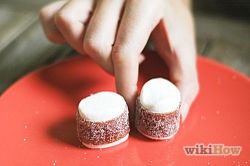 Place the marshmallow on its end.