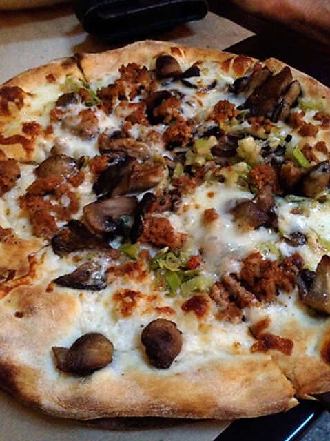
16. Fennel-Taleggio Make Herb Pizza top with sauteed fennel, 6 ounces sliced taleggio, 2 tablespoons chopped hazelnuts and grated pecorino before baking.