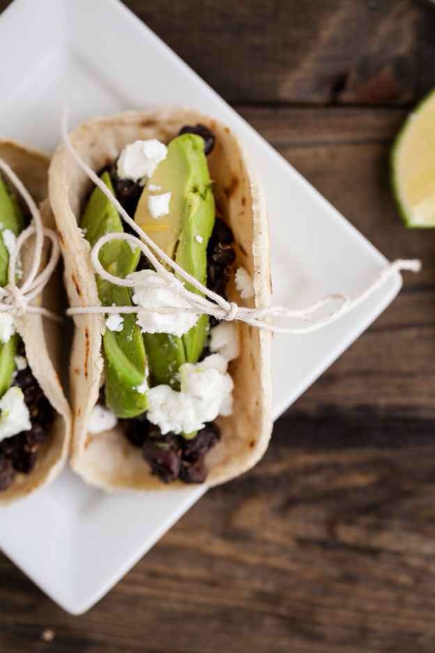 23. Tacos with Spiced Black Beans and Avocado
Tortillas + black beans + goat cheese + avocado + spices. (Optional: Lime-honey glaze.) Get the recipe.
http://naturallyella.com/2012/06/06/spiced-black-bean-grilled-avocado-and-goat-cheese-tacos/