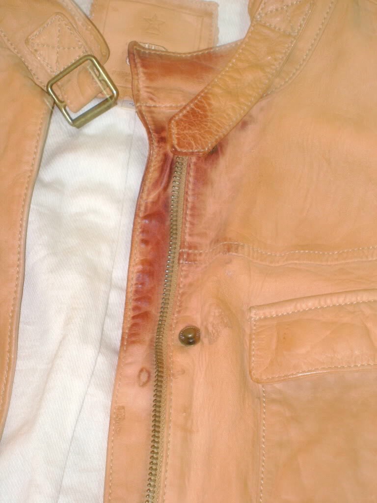 Use peanut butter to clean leather stains. You just rub some on the stain, then wipe it of with a clothe and that's it.