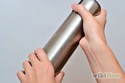 Shake well. Shake the ingredients together for 15 seconds, giving them enough time to blend and to be cooled by the ice.