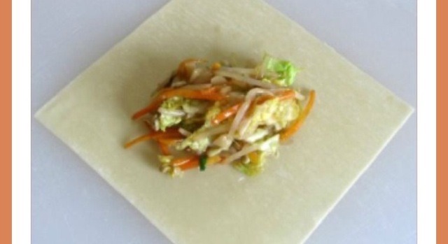 Put just over a quarter cup of CHILLED sautéed veggies into the egg roll wrapper.
