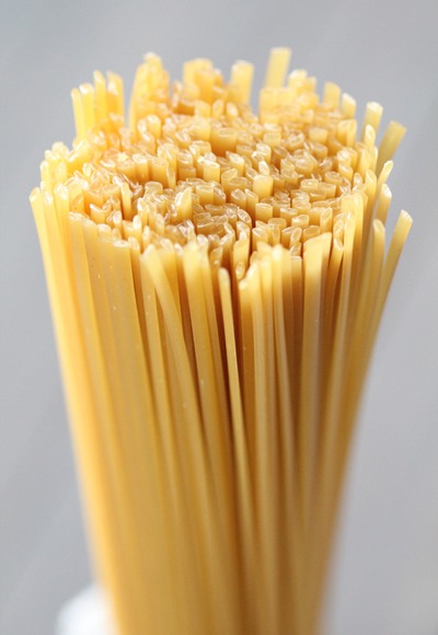 Cook sphagetti al dente according to the package instructions. But while it’s cooking, prepare your large Ziplock bags of food coloring.

I used six colors (red, orange, yellow, green, blue and purple), but you can use however many colors you prefer. 