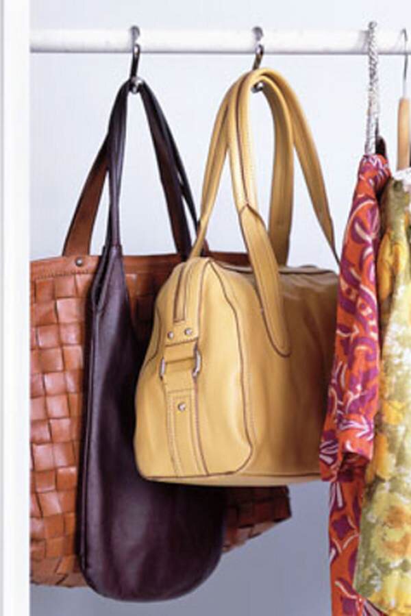 Hang your purses with shower curtain hooks