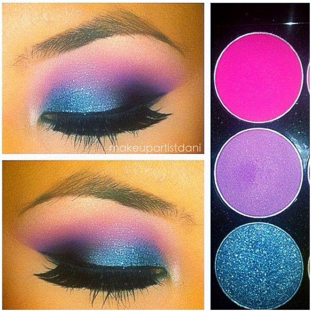 Pink in crease purple in V, Black in inner part of V and blend well, Blue on middle/inner lid, blue glitter over the blue shadow.